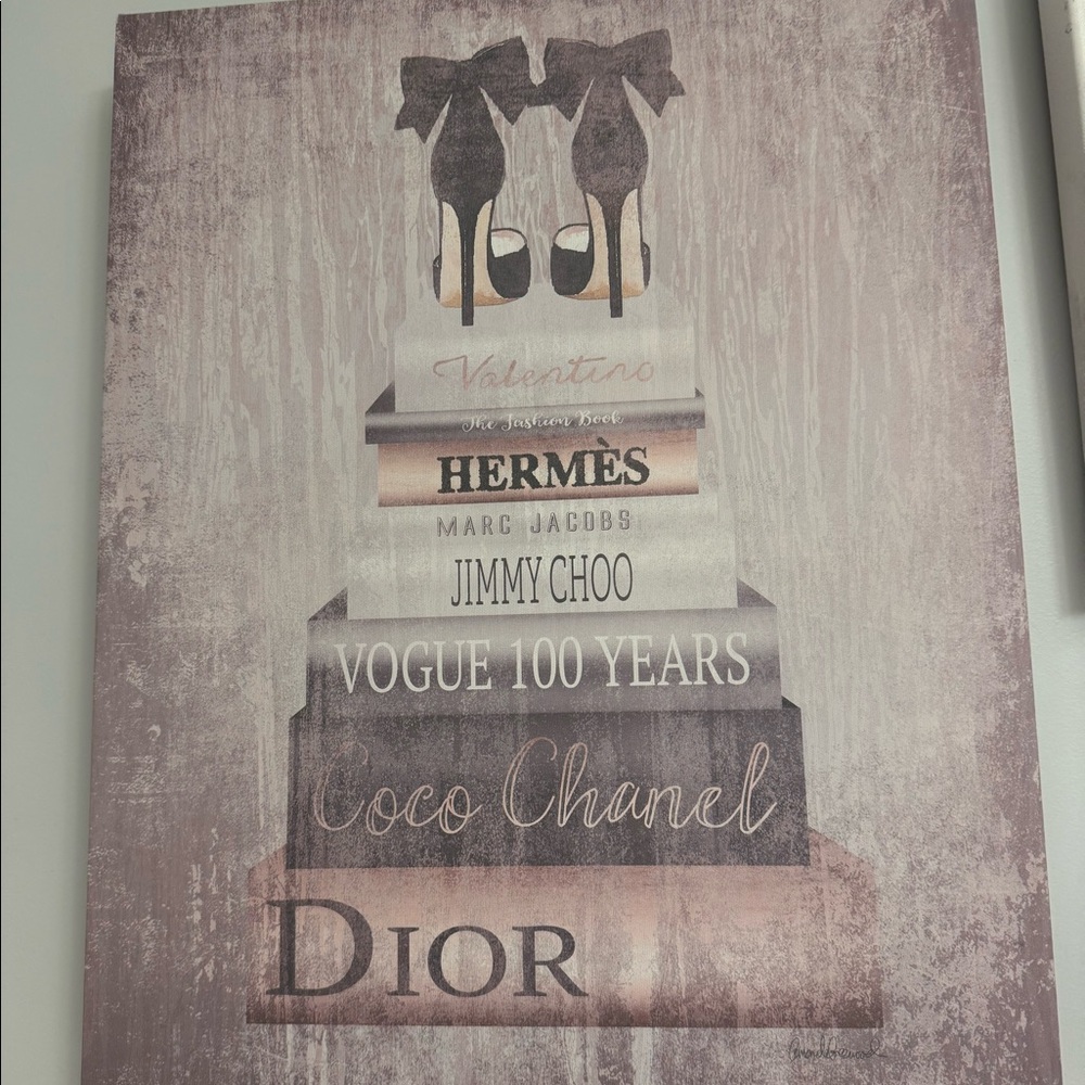 Fashion book stack wall art with high heels and brand names